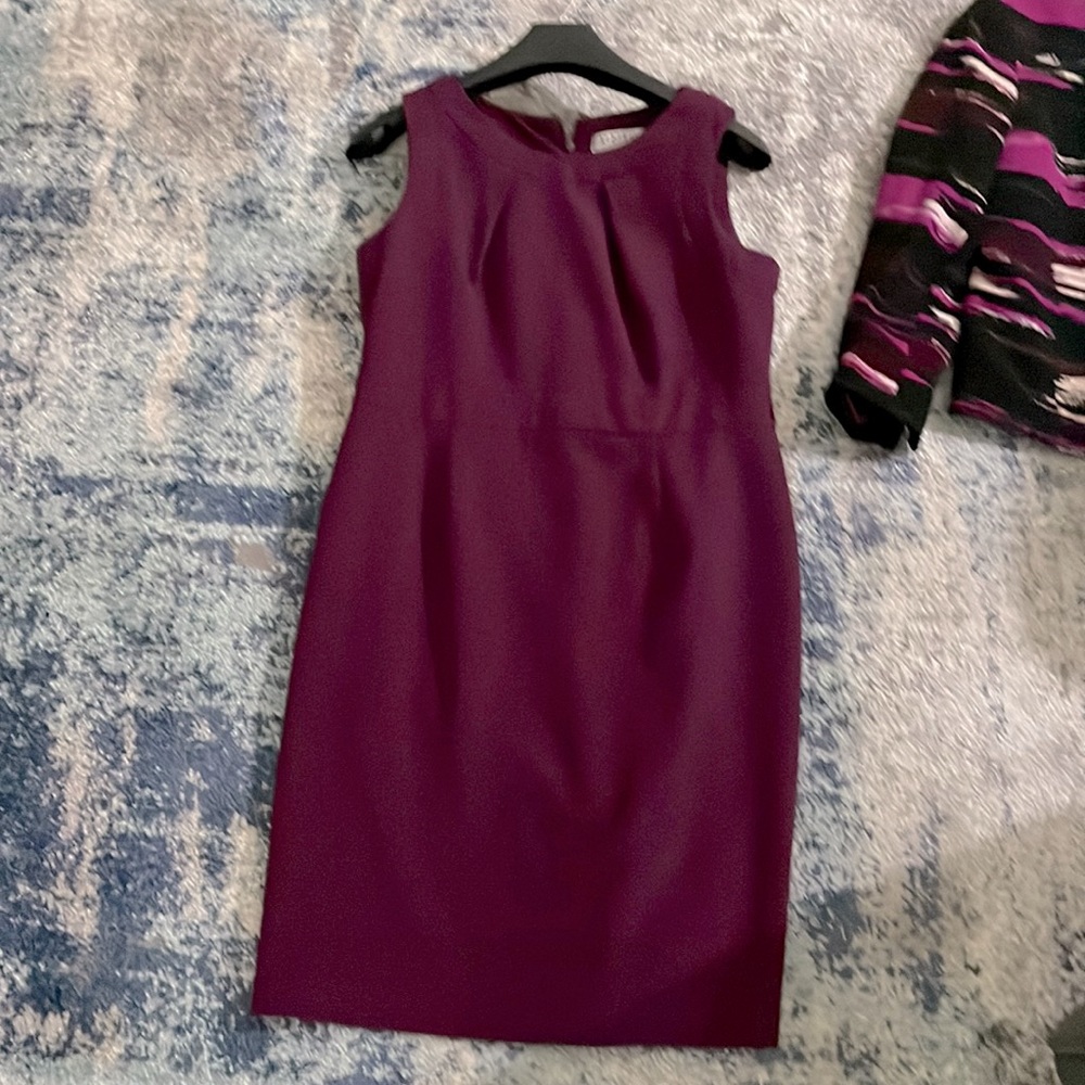 Two piece dress with jacket.